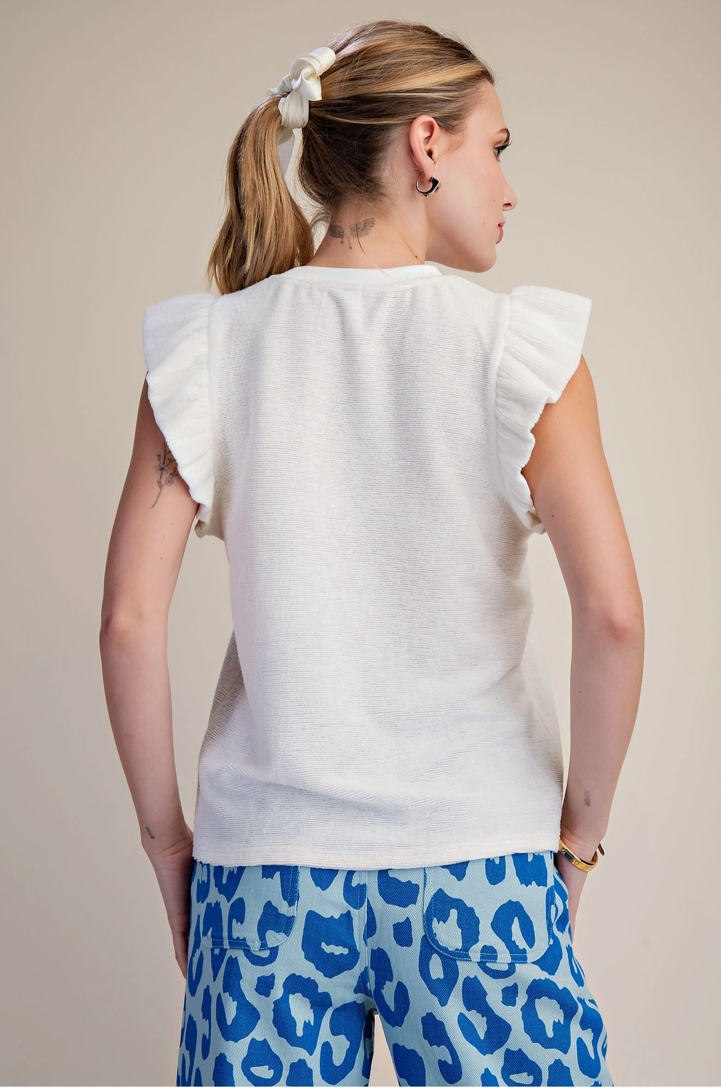 White Ruffle Knit Top in Soft Brush Fabric